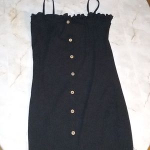 Black dress,buttons going down the middle,size:M,stretchy material,worn once